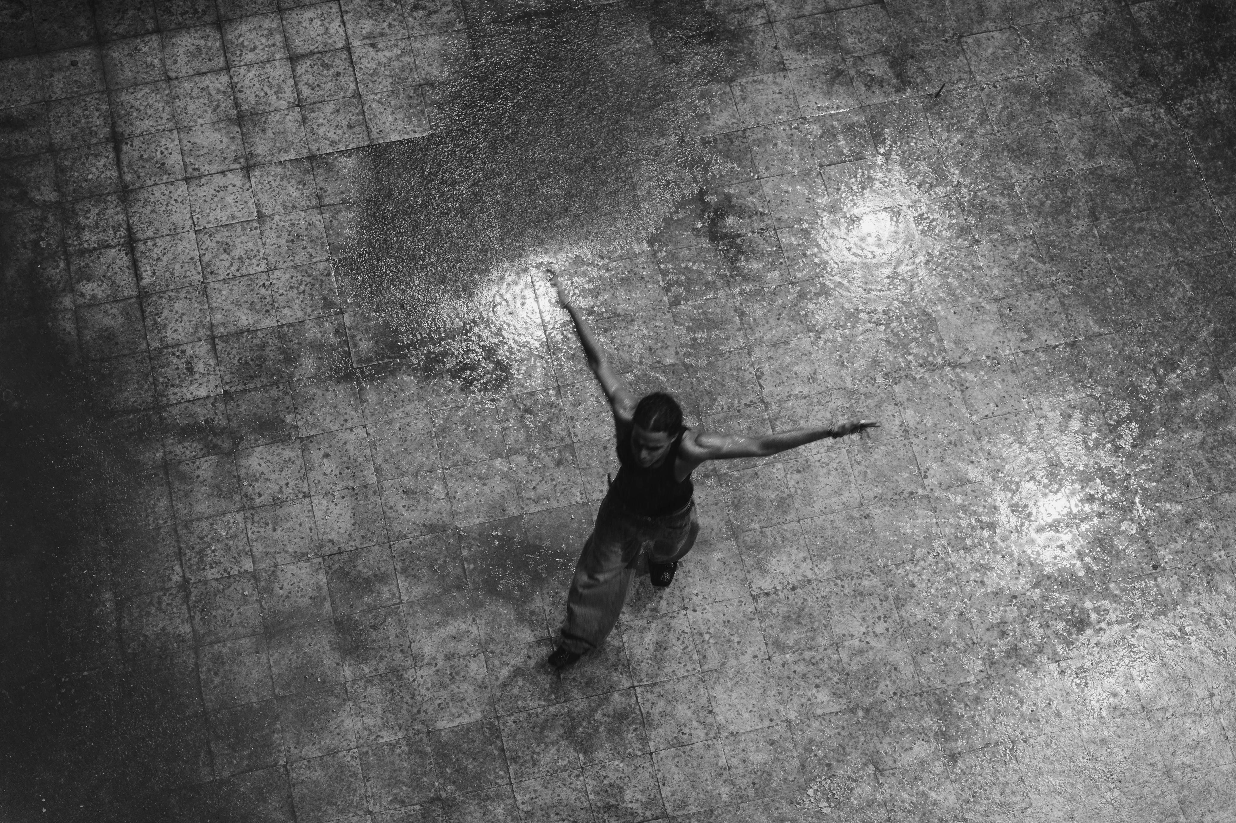 Artist in studio with INTIFADA text on shirt